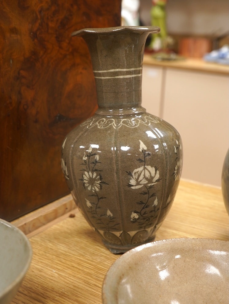 Five pieces of Chinese/Korean celadon comprising three bowls and two vases, 31cm high. Condition - some breaks